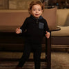 Little one in a colorblock strip denim coordinated set, trendy matching sibling outfit for casual family outings.