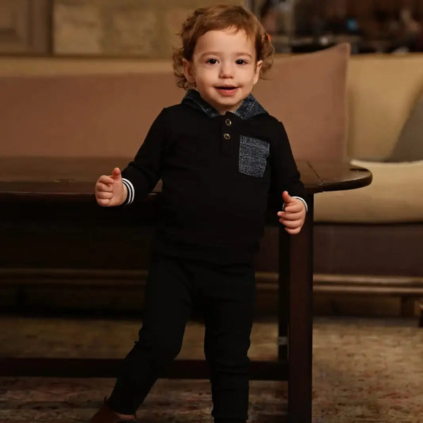 Little one in a colorblock strip denim coordinated set, trendy matching sibling outfit for casual family outings.