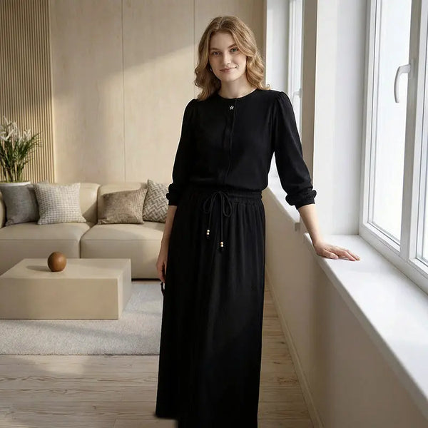 Woman dressed in a breathable cotton modal Sabbath skirt set, elegant modest fashion for Shabbat observance.