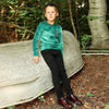 Young boy in the overlay edit layered set, trendy matching brother style for contemporary family looks.