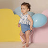 Little one dressed in a blue bloom Shabbos set, coordinated family collection for special Shabbat gatherings.