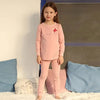 Little lady wearing a kite embroidery detailed set, whimsical matching sister outfit for joyful family moments.
