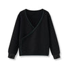 Little gentleman dressed in a black waffle cardigan, refined matching brother outfit for smart family occasions.