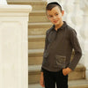 Young boy in an irregular pocket unique set, modern matching brother style for contemporary family looks.