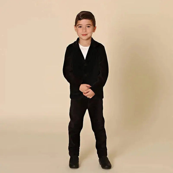 Little gentleman wearing a corduroy floral Shabbos set, elegant matching brother outfit for festive celebrations.