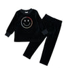 Child in a casual velour smile embroidery set, playful matching outfit for joyful family moments.