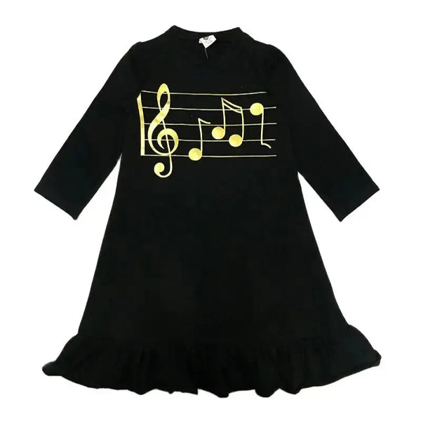 Little lady dressed in a black musical jersey set, harmonious matching sister outfit for celebratory occasions.