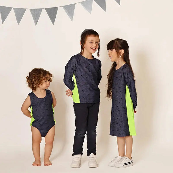 Young boy wearing a sunglasses print fun set, cool matching brother style for stylish family outings.