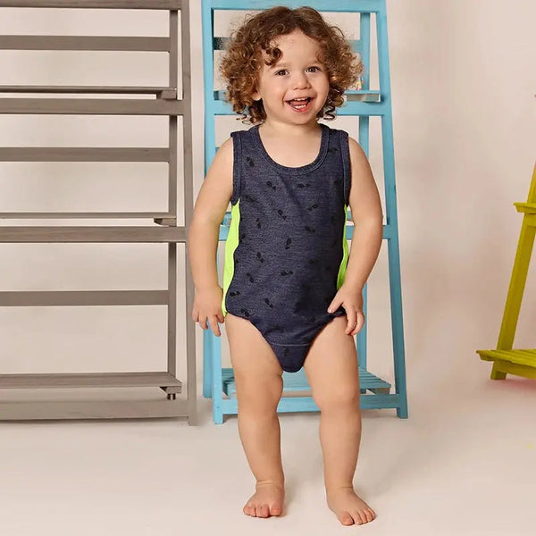 Toddler in a sunglasses print fun set, cool matching sibling outfit for stylish family outings.