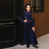 Young girl dressed in a luxury navy velour soft set, plush matching sister style for elegant family occasions.