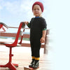 Toddler in a colorpop chic waffle textured set, stylish matching sibling outfit for modern family gatherings.