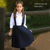 Little lady dressed in a school uniform classic set, polished matching sister outfit for formal occasions.