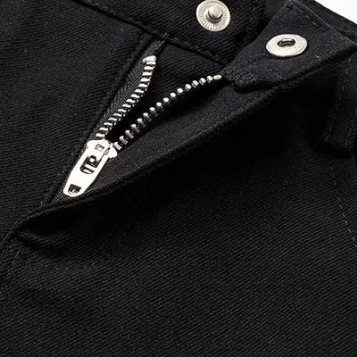 Back detail of boys' weekday pants with real pockets