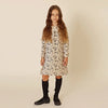 Young girl wearing a corduroy Shabbos set, elegant matching sister style for traditional celebrations.
