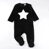 Toddler in a classic baby romper, simple matching sibling outfit for everyday family moments.
