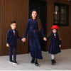 Little gentleman dressed in a luxury navy velour soft set, plush matching brother outfit for special occasions.