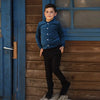 Boy wearing black Go-To Shabbos Pants in heavyweight stretch Ponte di Roma